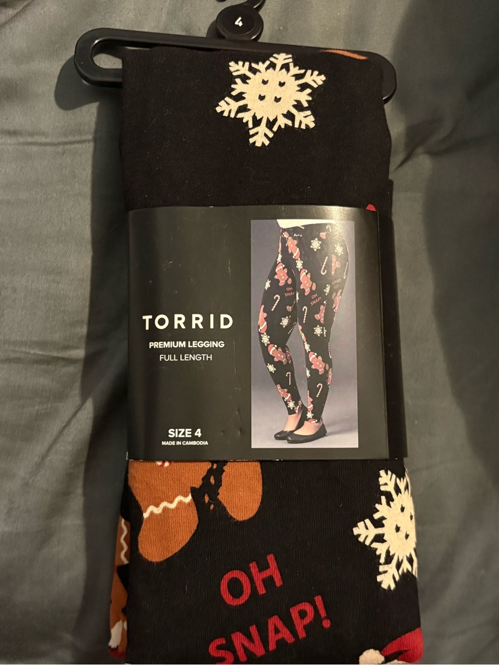 79-torrid Black gingerbread Leggings with Snowflakes & Red Text